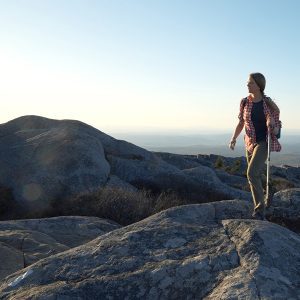 Female hiker on top of Mt Monadnock