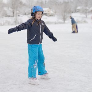 Skating outdoors on a frozen pond